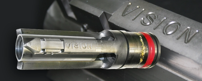 Engraved metal drill part.